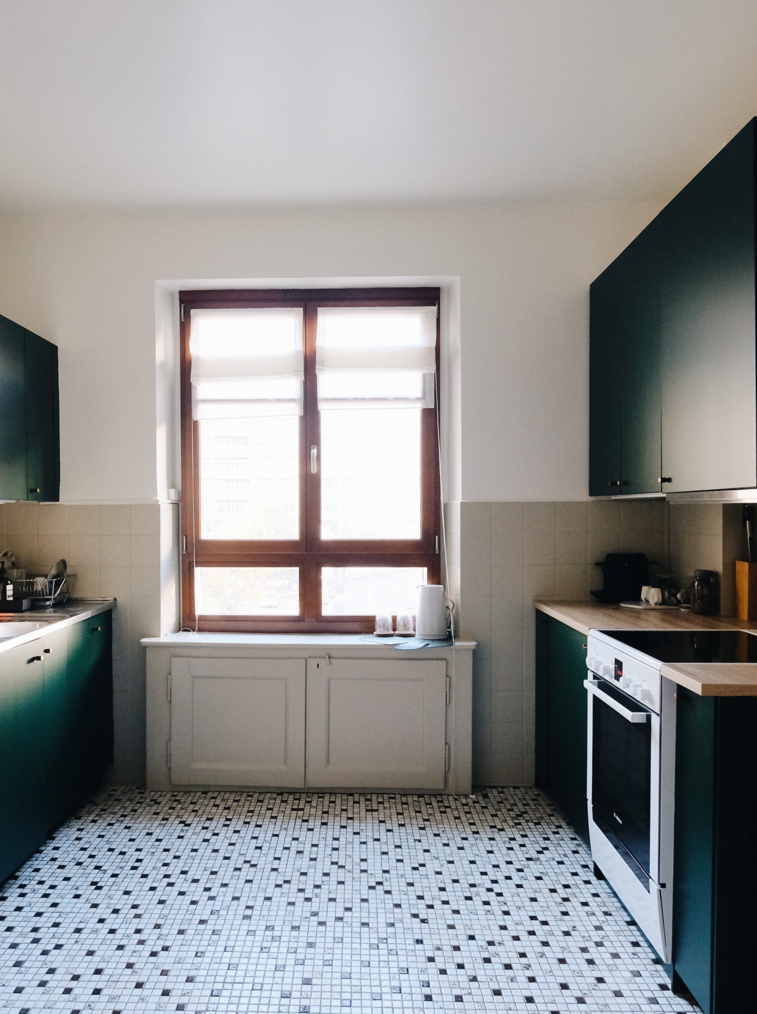 The dark green ikea kitchen, a general view