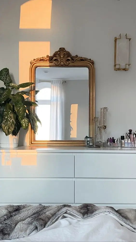 antique mirror above dresser in bed room