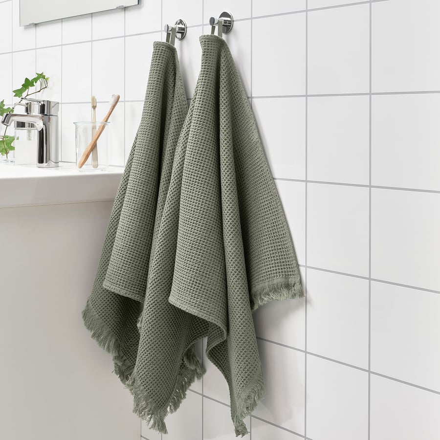 IKEA VALLASÅN light green waffle hand towels in a bathroom