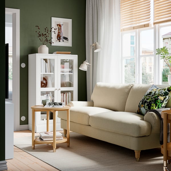 IKEA VALNÄS two-seat sofa in light beige in a bright living room